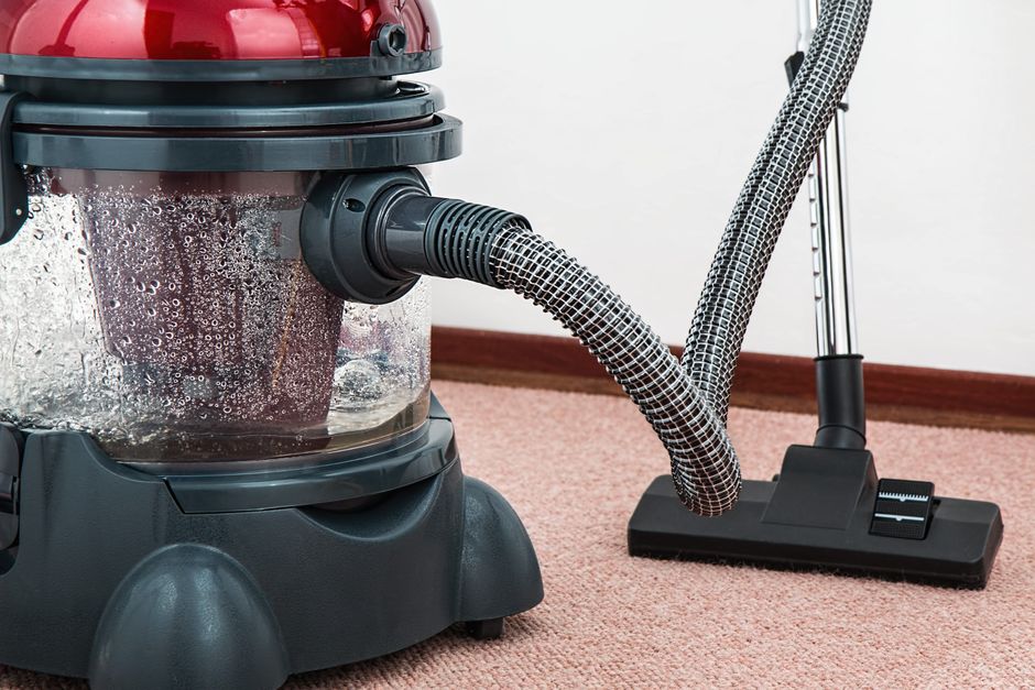 Wet, stained carpet showing water damage