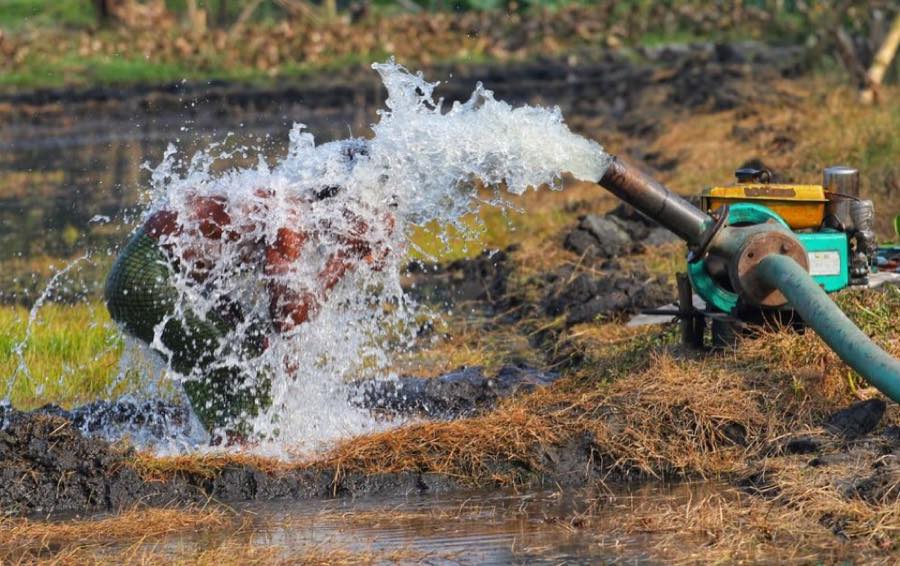 Pump and hose set up for emergency water removal from a flooded area