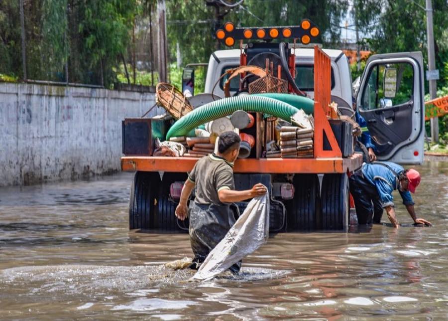 Crew responding to flood cleanup after heavy rain