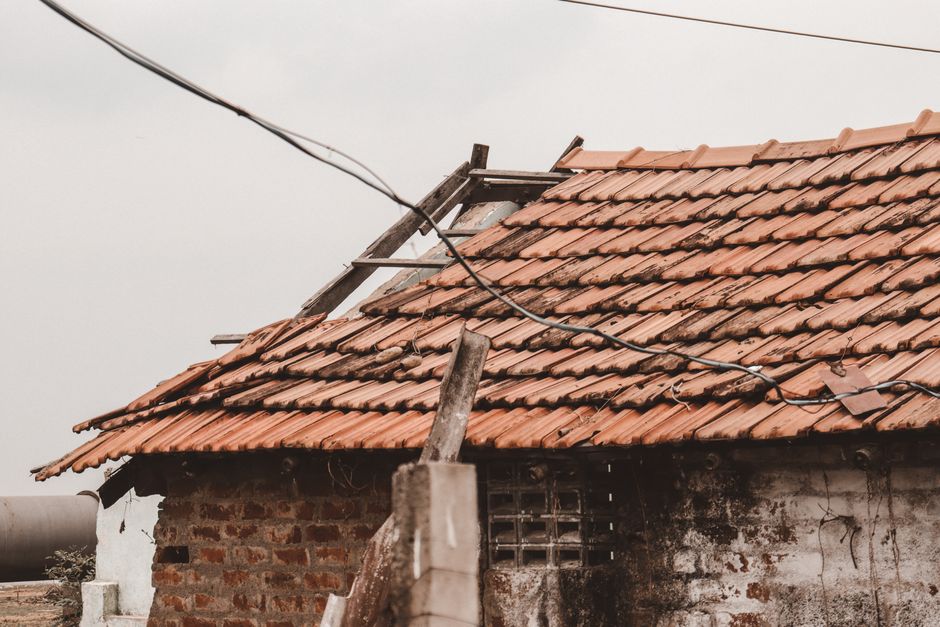 Storm-damaged roof shingles that can lead to a water leak