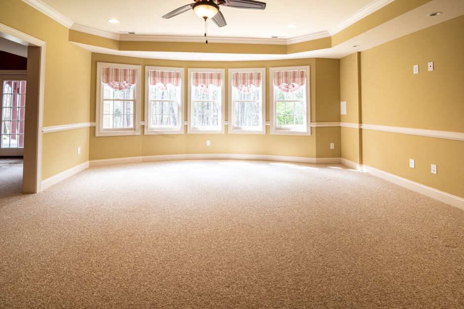 Air mover positioned on a floor for structural drying